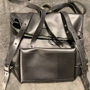 Sleek Black Leather Laptop Backpack
